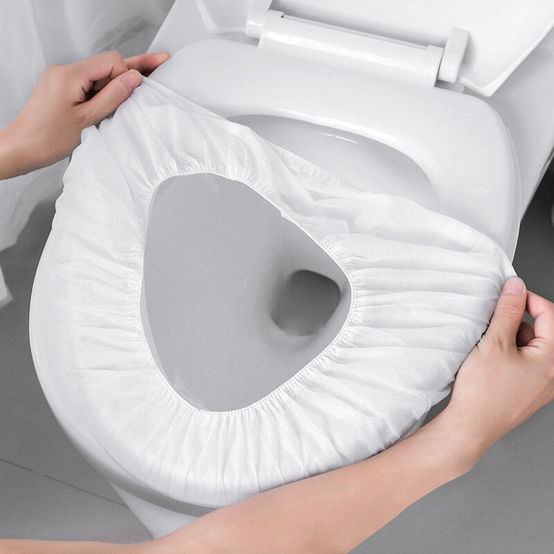 Disposable toilet seat travel sticker portable toilet seat cushion paper maternity non-woven waterproof universal toilet cover toilet seat toilet seat
