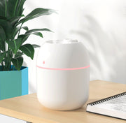 Household USB plug-in mini desktop humidifier small car portable can be equipped with light small fan gift mini humidifier 200ml