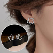 Sweet flower ear cuff for women without pierced ears, unique hollow camellia ear cuff, niche, high-end, light luxury ring