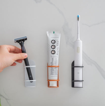 2 PCS Punch-Free Toothbrush Holders Wall-Mounted Suction Storage Racks - One Orange, One Black. Iron Art Electric Toothbrush Wall Mount Punch-Free Toothbrush Holder Wall-Mounted Hanger Suction Storage Rack Bathroom Toothbrush Storage