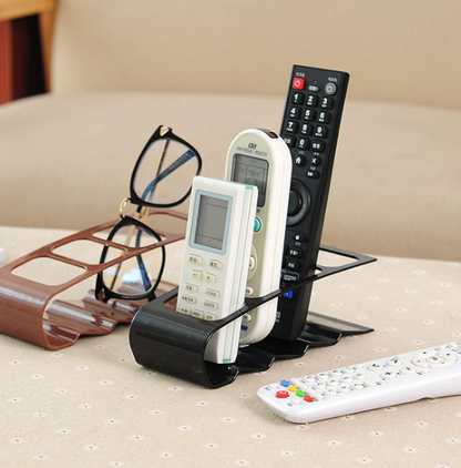 Creative four-compartment remote control storage rack plastic desktop storage rack storage seat