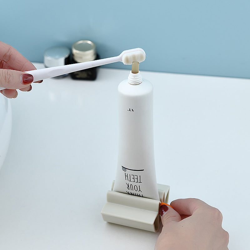 Lazy toothpaste squeezer, creative and simple toothpaste clip, facial cleanser press, children's manual toothpaste squeezer, toothbrush holder