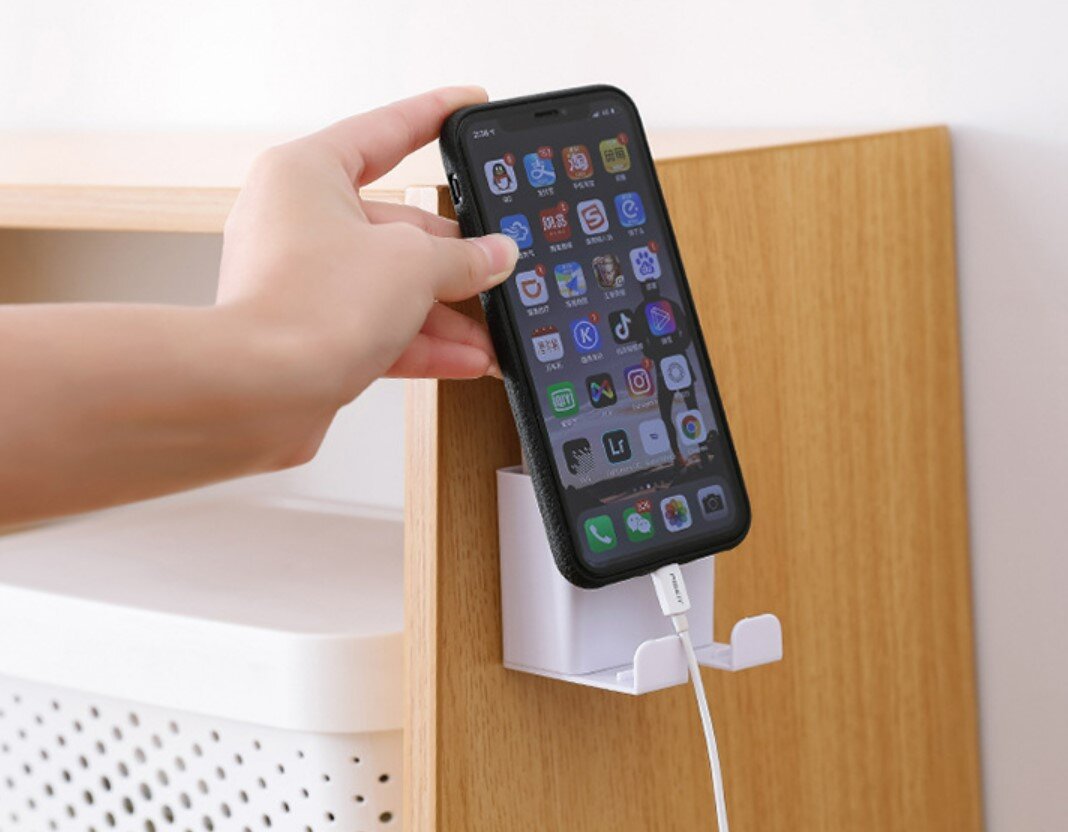 Wall-mounted remote control storage box, mobile phone charging bracket, punch-free power cord socket storage rack, desk and wire storage